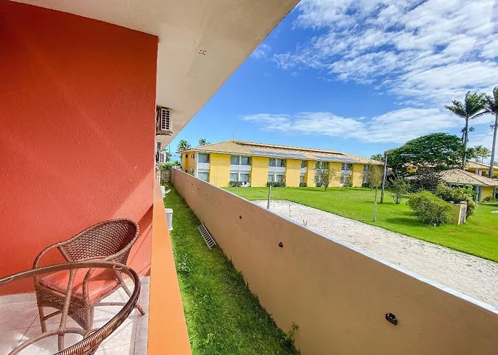 Flat frente praia de Taperapuã, atravessou a rua está na praia, com piscina, sauna e café da manhã como cortesia Porto Seguro